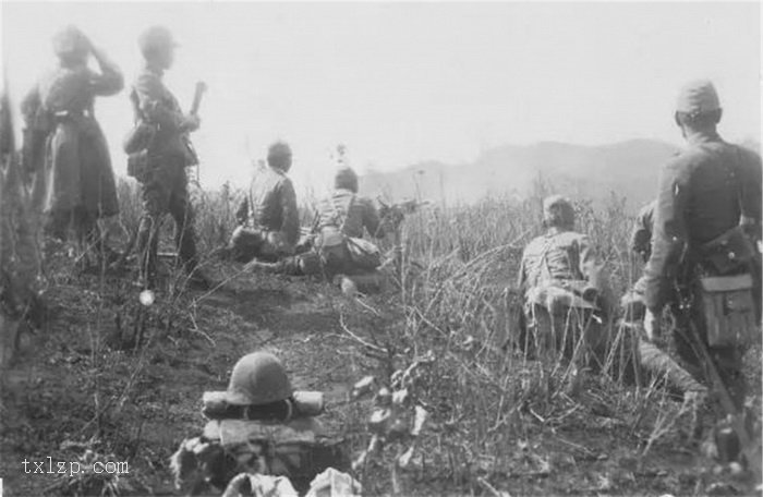 图片[1]-The Japanese aggressors who are besieging and suppressing the Northeast Anti Japanese Army soldiers took photos-China Archive